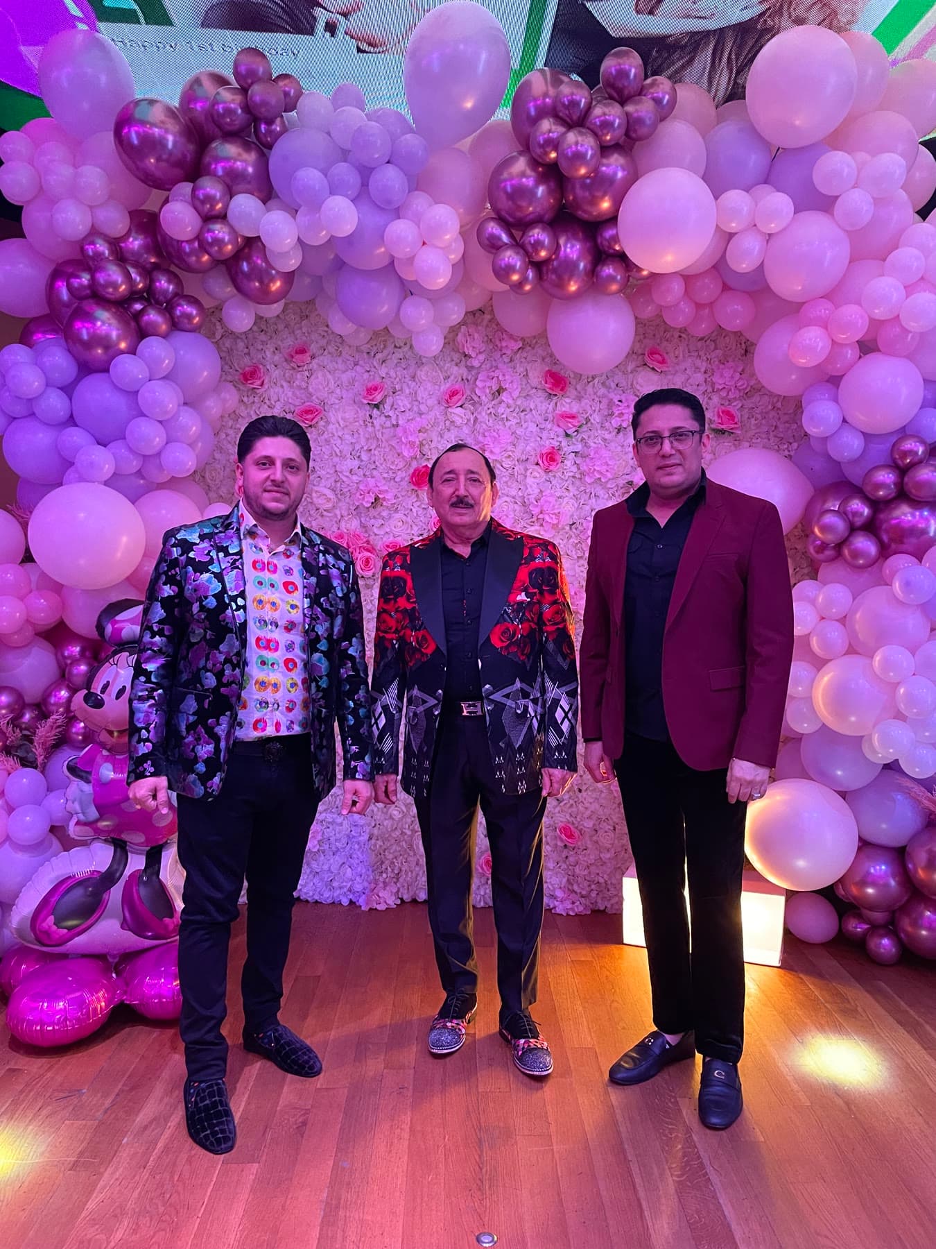Lazar standing with event guests