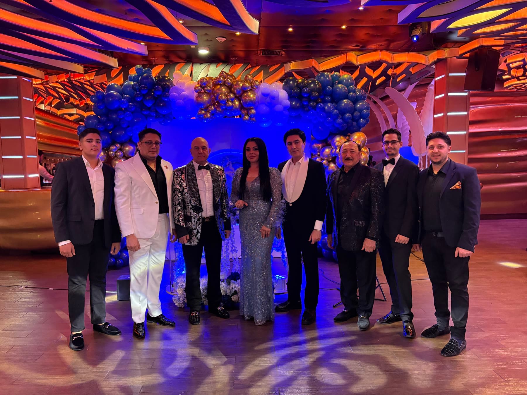 Lazar standing with a group at an event