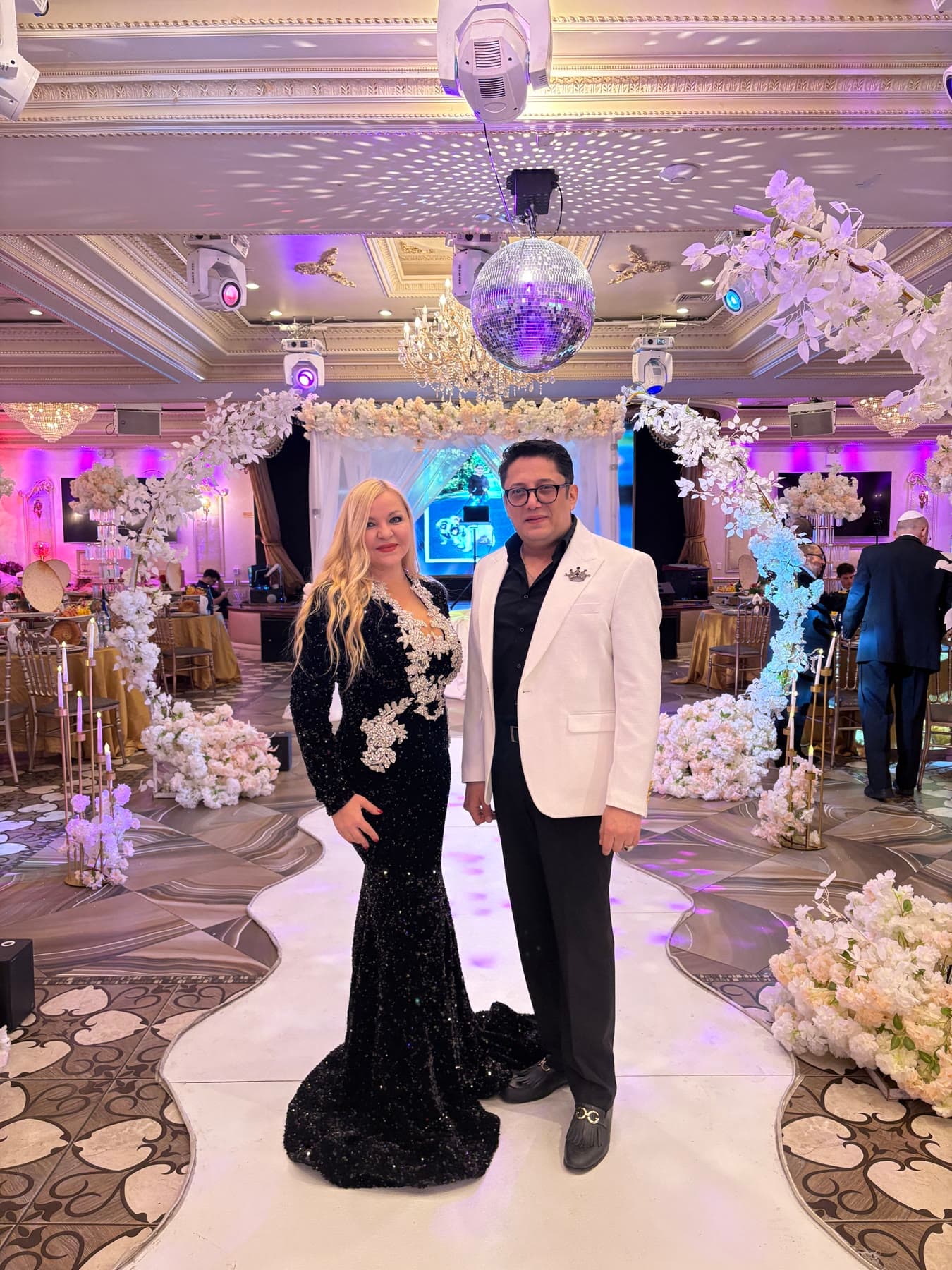 Lazar in a decorated ballroom