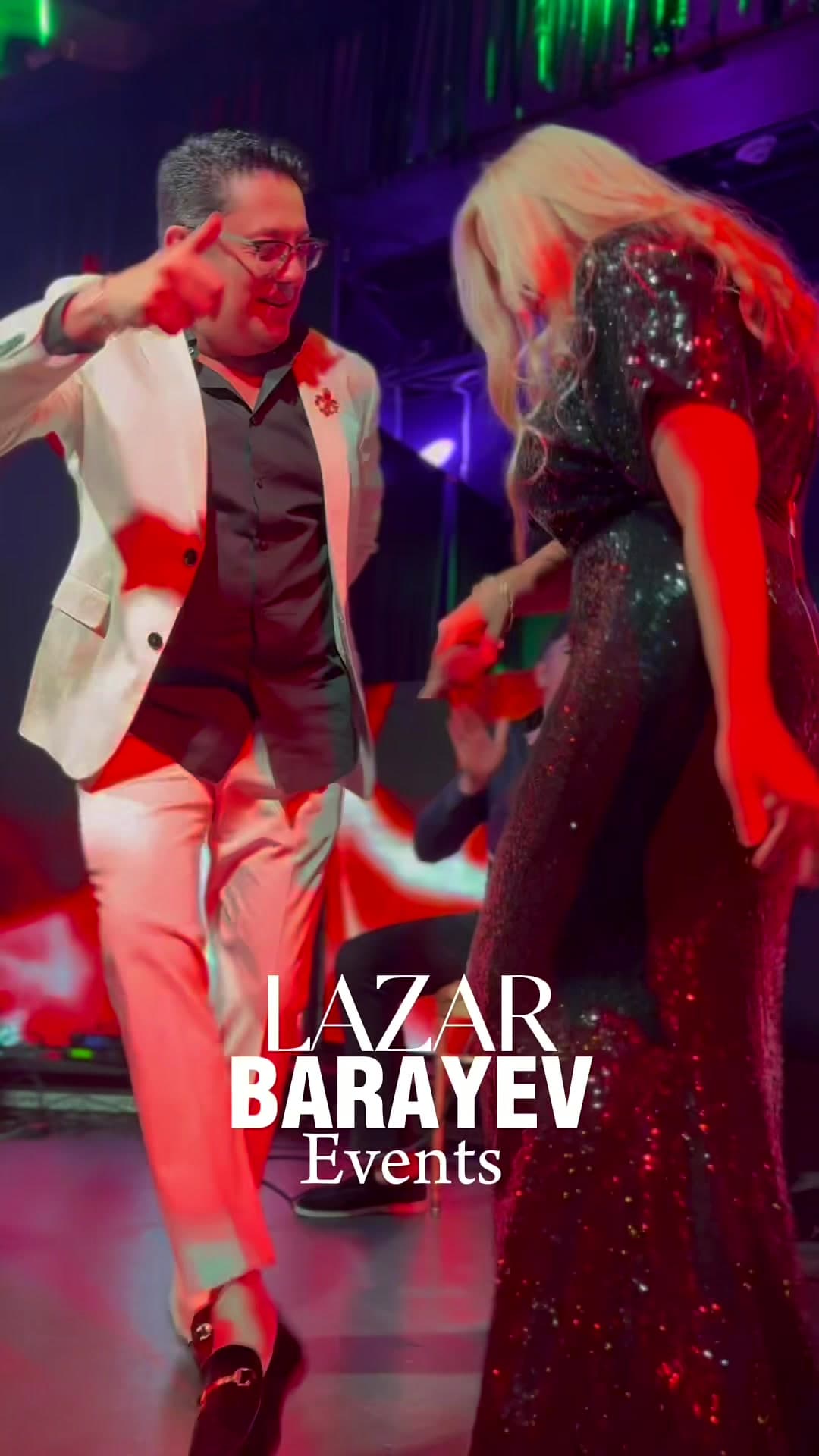 Lazar Barayev leading a celebration