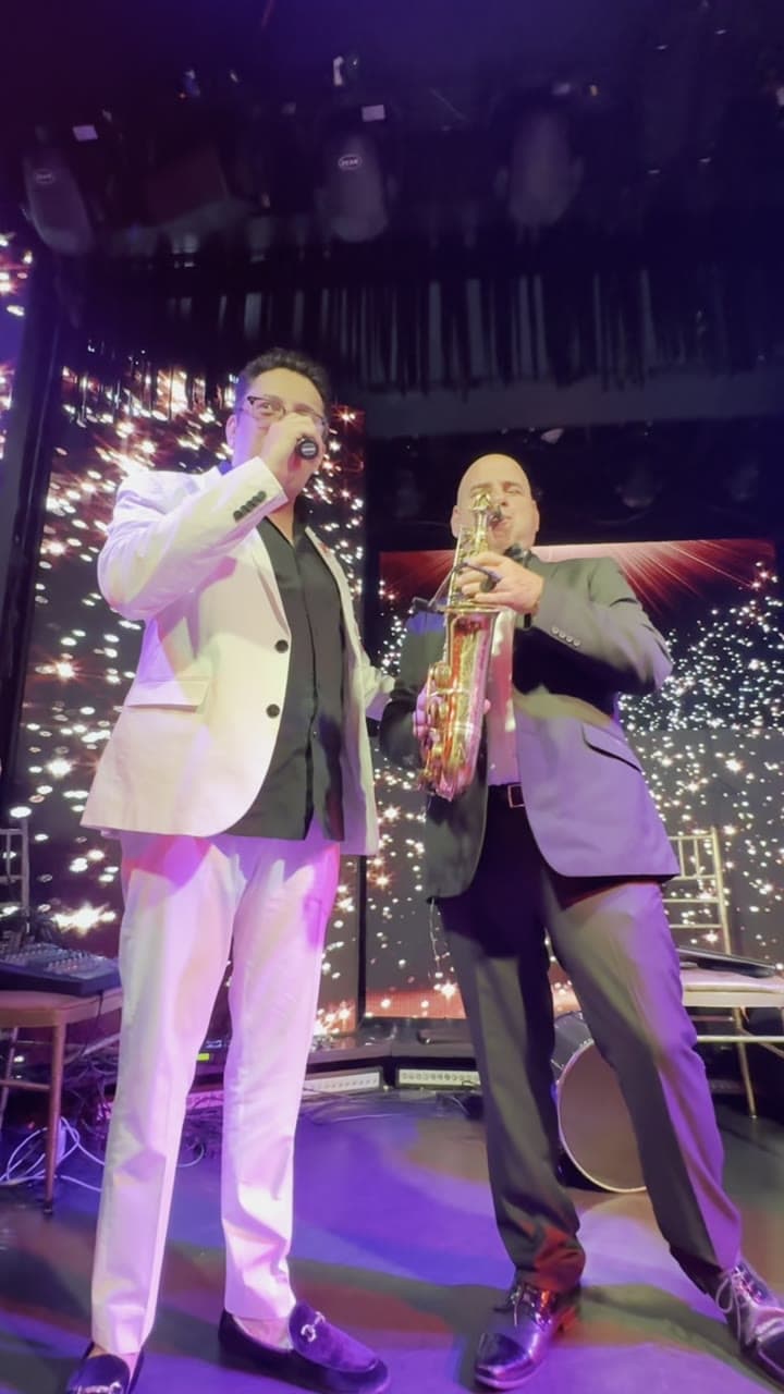 Lazar Barayev performing with a musician
